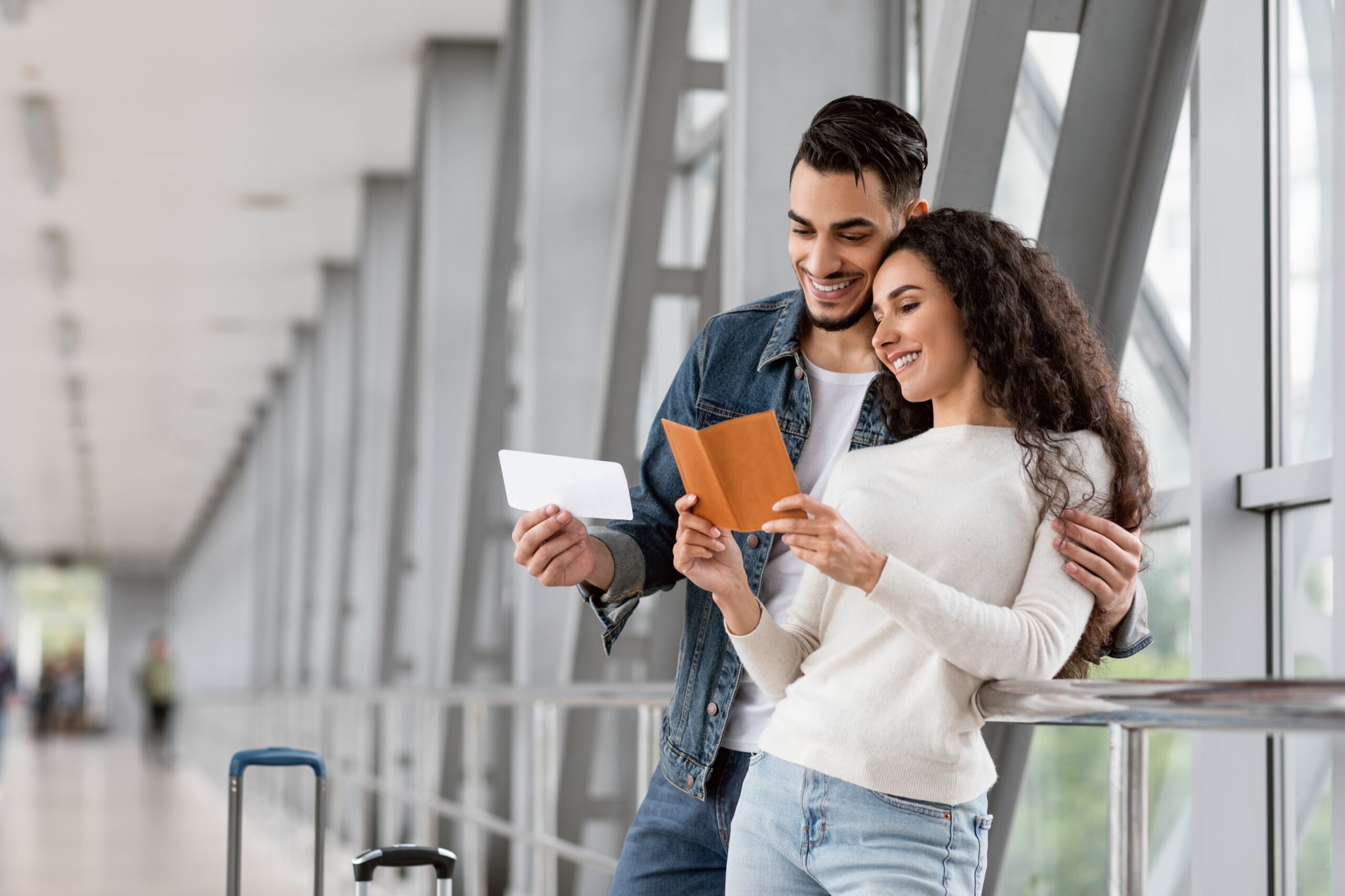 Travel,Insurance,Concept.,Portrait,Of,Happy,Young,Arab,Couple,Waiting